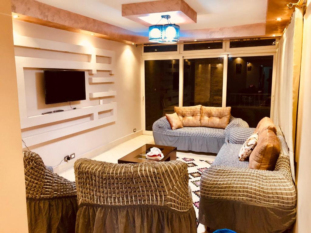 Posezení v ubytování Toscanini Apartament اول صف مباشره