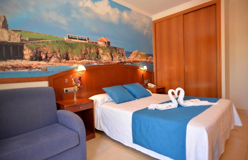 Postel nebo postele na pokoji v ubytování Hotel Portonovo