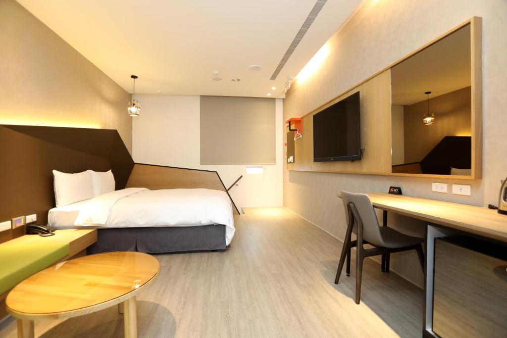 Postel nebo postele na pokoji v ubytování SUNLINE Motel & Resort