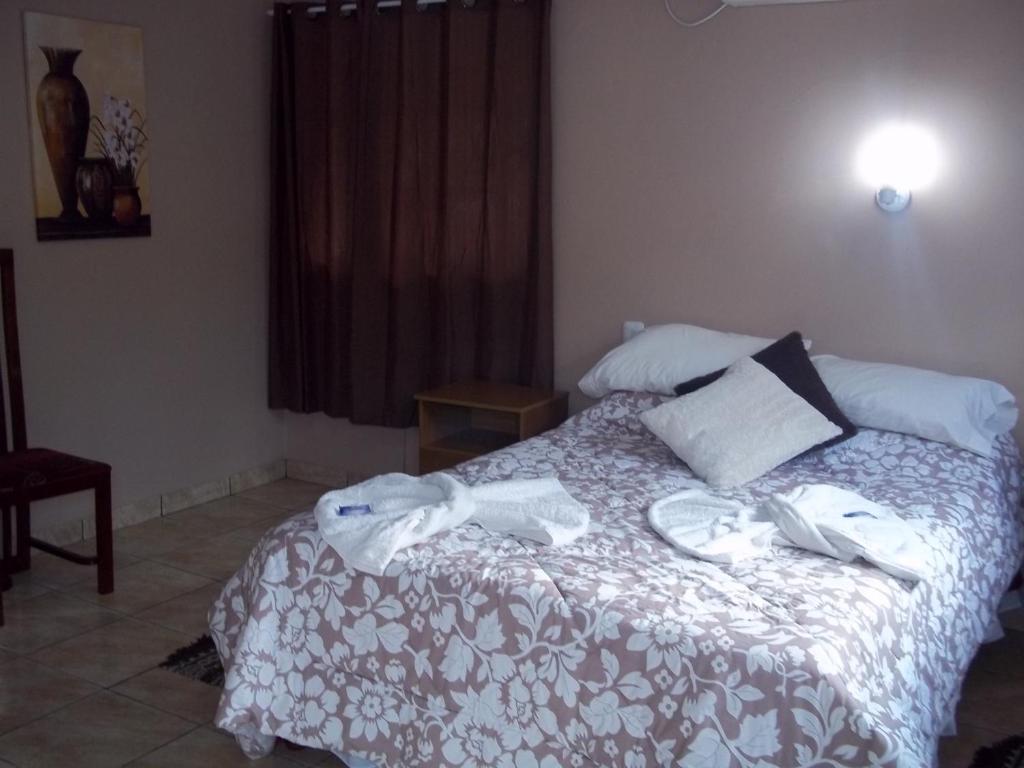 Postel nebo postele na pokoji v ubytování Posada Iguazu Royal