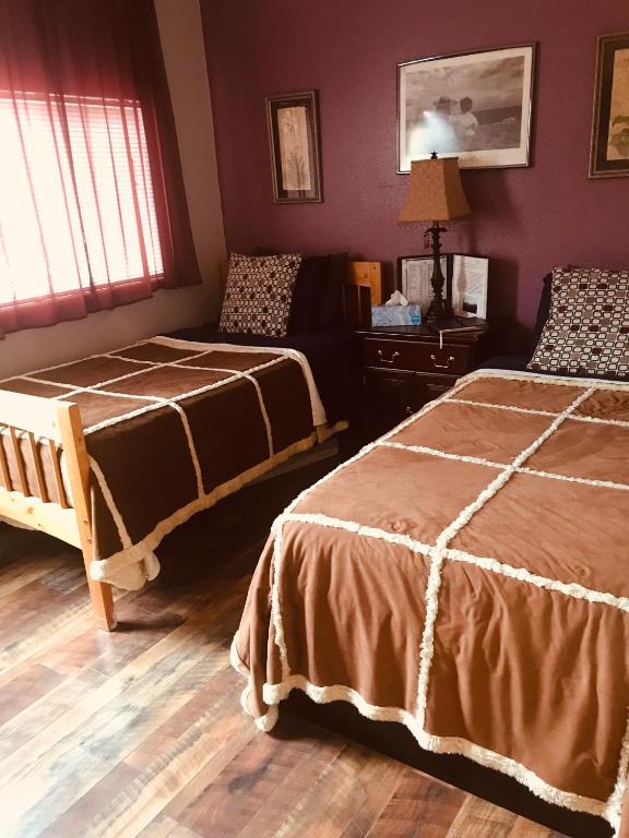 Postel nebo postele na pokoji v ubytování A Hyde Away Inn B&B