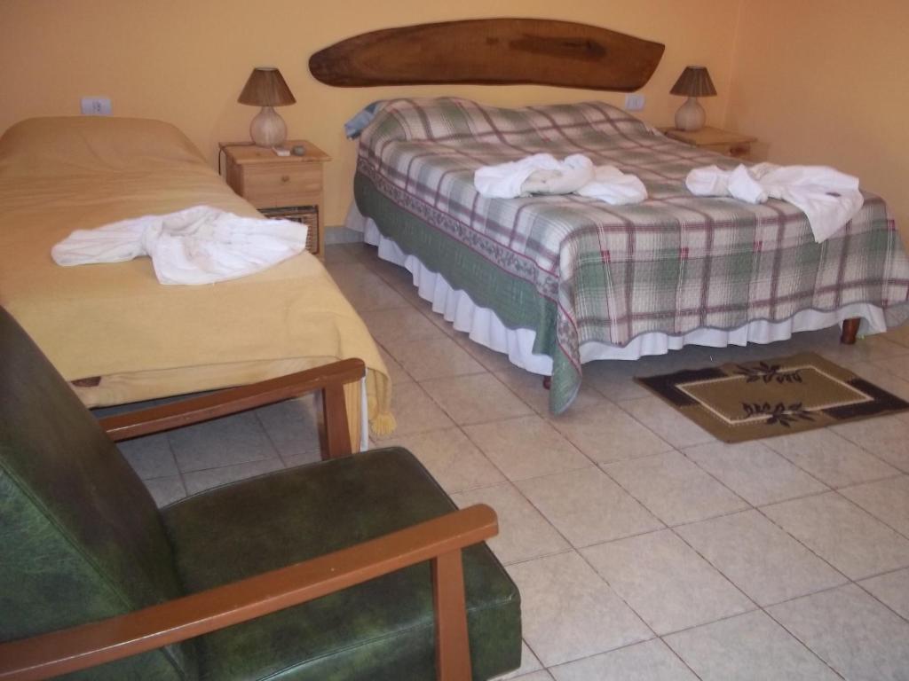 Postel nebo postele na pokoji v ubytování Posada Iguazu Royal