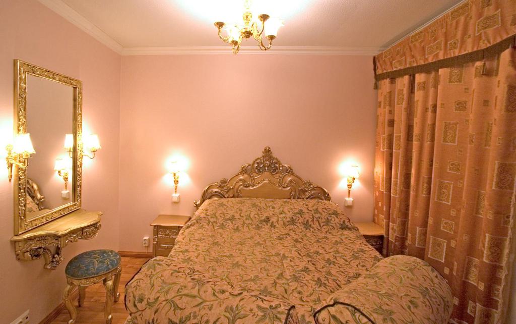 Postel nebo postele na pokoji v ubytování Mango Hotel