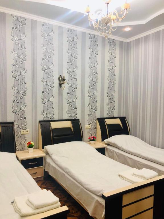 Postel nebo postele na pokoji v ubytování Har-Mar Hotel