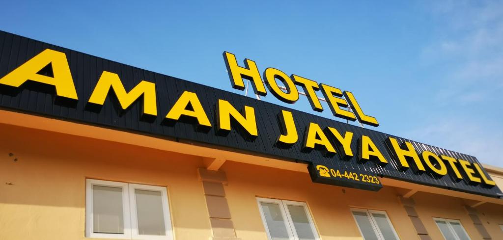 a sign for a hotel aman jayagi at Amanjaya Hotel in Sungai Petani