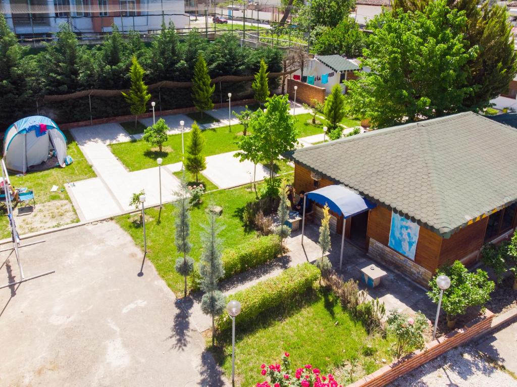an overhead view of a park with a small building at Guesthouse Villa Juri in Berat