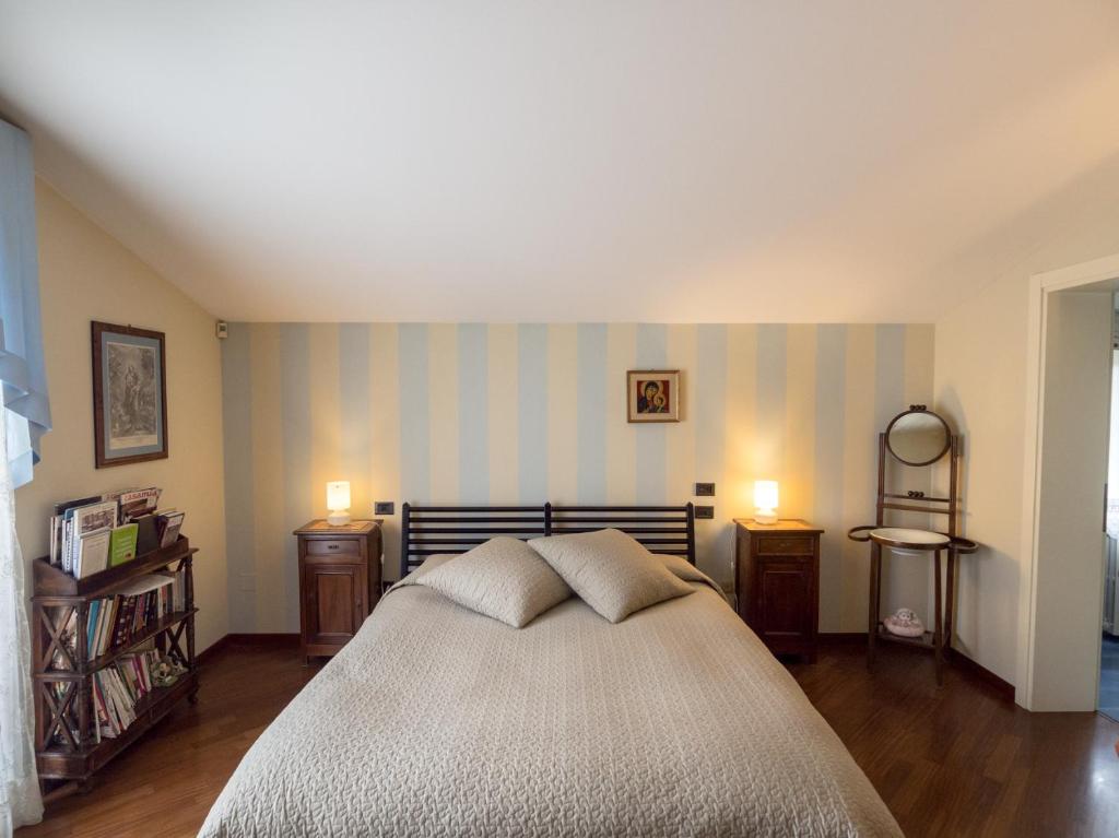 Postel nebo postele na pokoji v ubytování La Via Francigena B&B