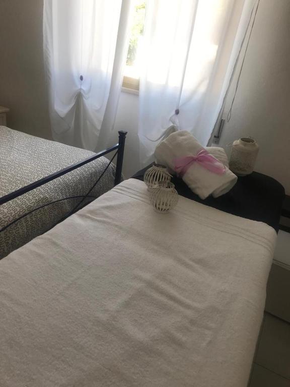 Postel nebo postele na pokoji v ubytování Villa Midolo