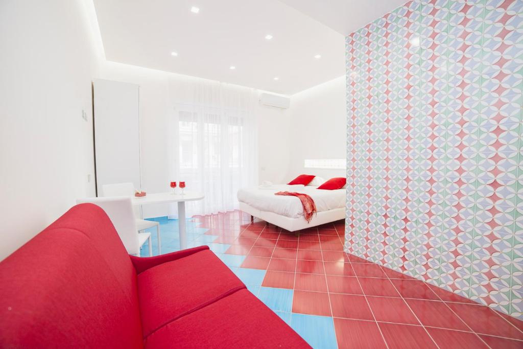 Posezení v ubytování Hotel De Rosa