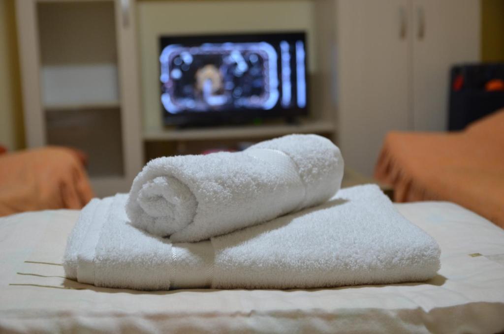 Postel nebo postele na pokoji v ubytování Dora Apartment