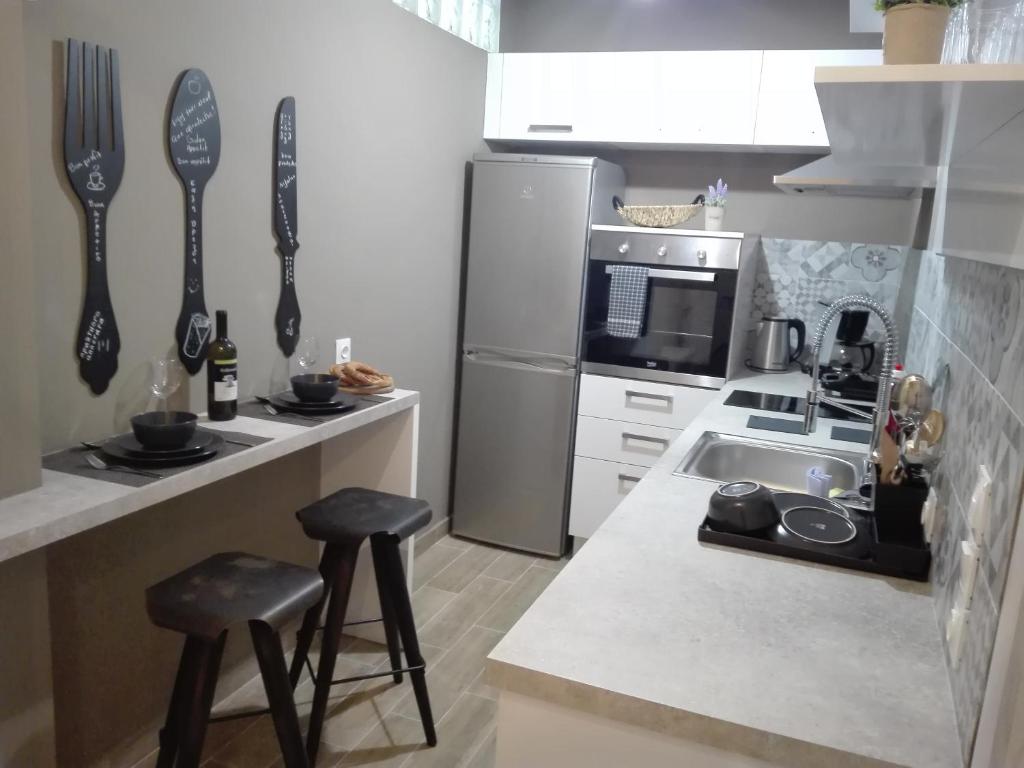 Kuchyň nebo kuchyňský kout v ubytování Athens city center cozy apartment