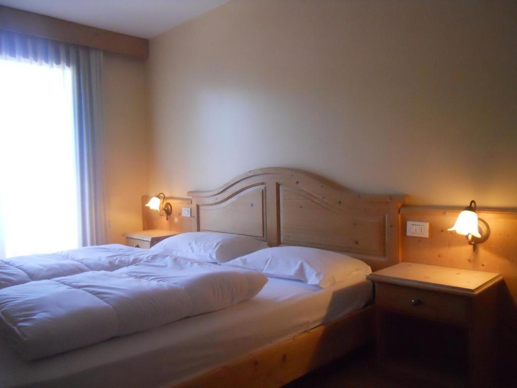 Łóżko lub łóżka w pokoju w obiekcie Park Hotel Miramonti