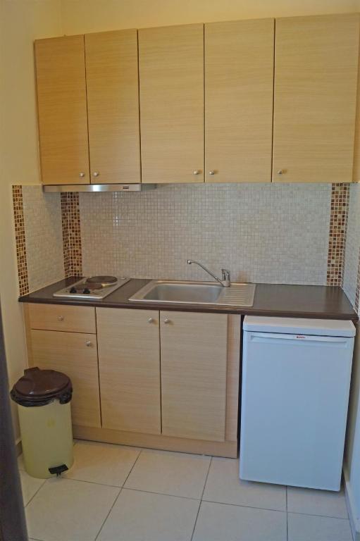 Kuchyň nebo kuchyňský kout v ubytování Pouliezos Koklanis Zante Apartments