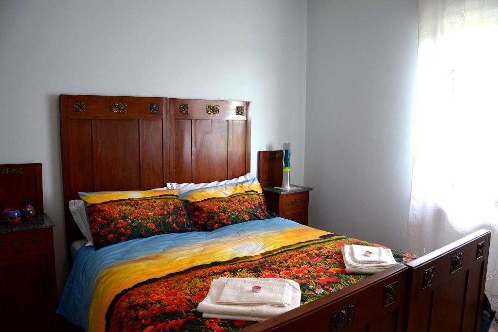 En eller flere senge i et værelse på Il Gelsomino Assisi