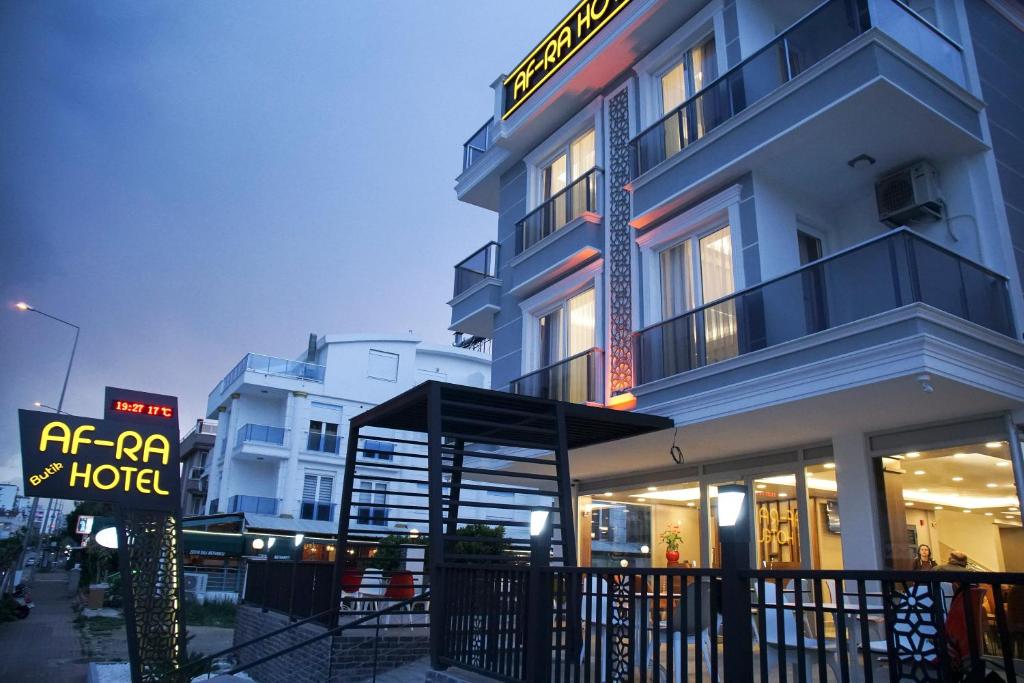 un edificio con un cartello di fronte di AF-RA Hotel a Antalya (Adalia)