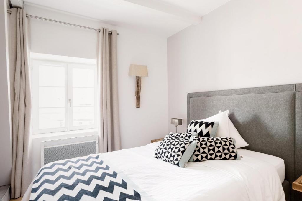Postel nebo postele na pokoji v ubytování Reflets Sur La Lauch appartements