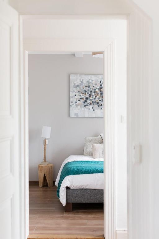 Postel nebo postele na pokoji v ubytování Reflets Sur La Lauch appartements