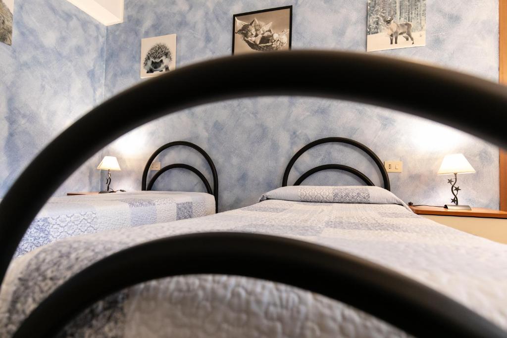 Postel nebo postele na pokoji v ubytování Agriturismo Jesson Rosamund