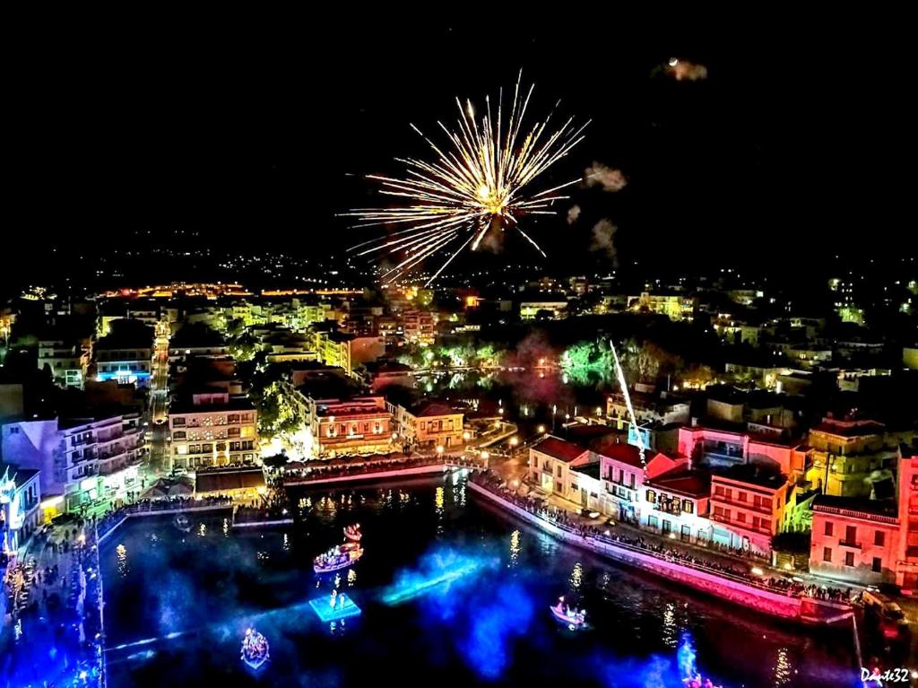 a view of a city at night with fireworks at Vrokastro Apartments in Istro