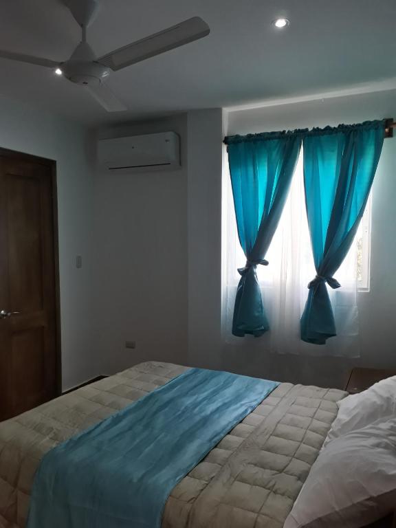 Letto o letti in una camera di Figaro Hotel Samana