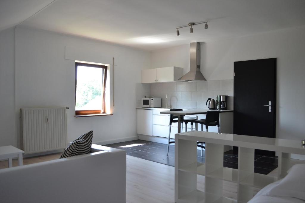 Kuchyň nebo kuchyňský kout v ubytování B&B Pommerloch