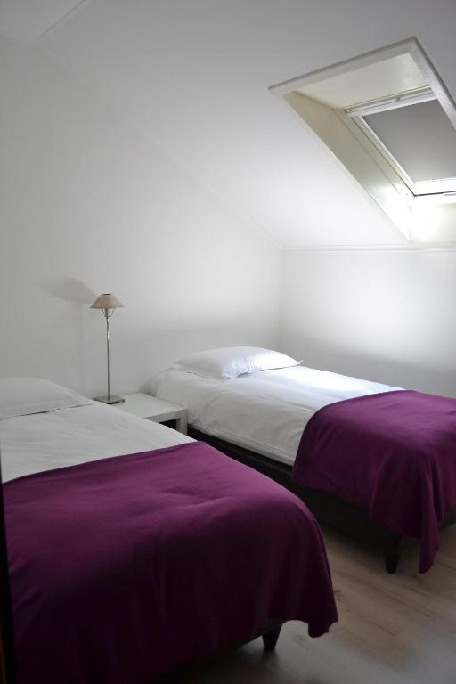 Postel nebo postele na pokoji v ubytování B&B Pommerloch