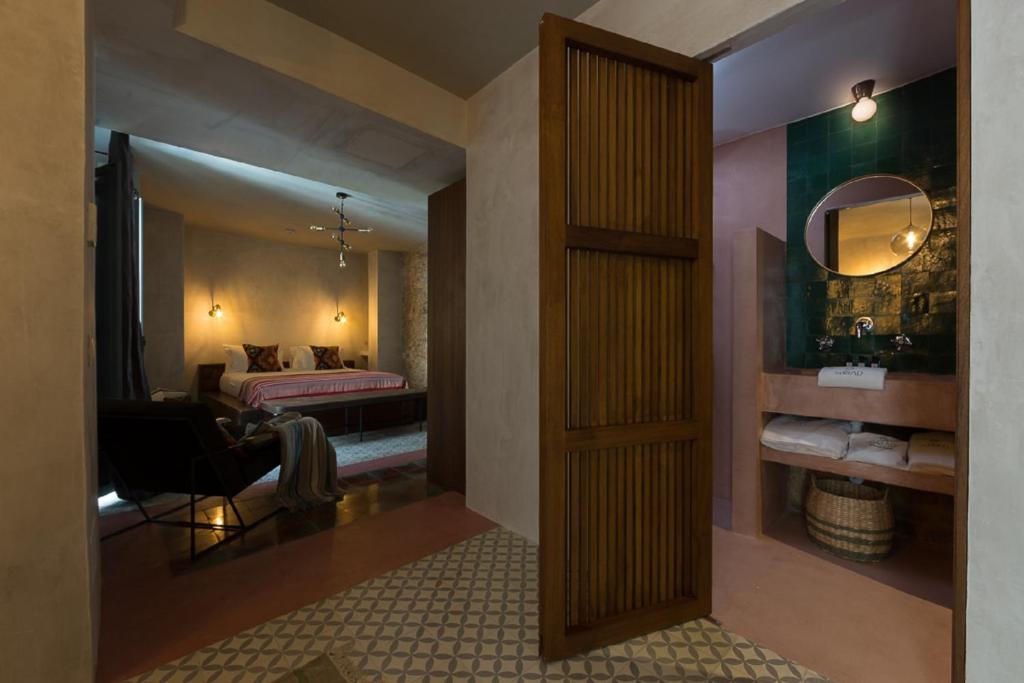 Postel nebo postele na pokoji v ubytování The Riad - Adults Only
