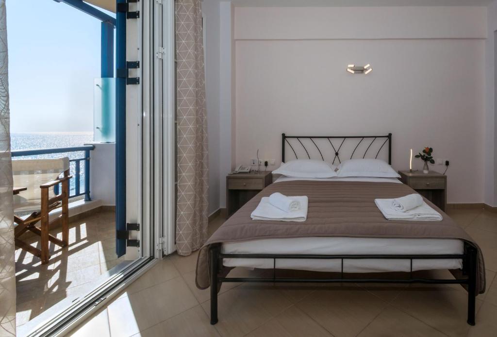 Voodi või voodid majutusasutuse Anesis Hotel toas