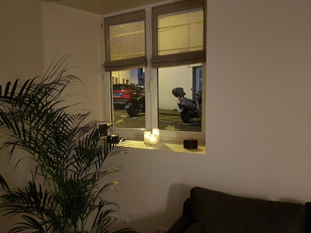Posezení v ubytování Hôtel Au Bon Coin
