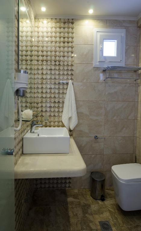 Koupelna v ubytování Aparthotel Pagidas