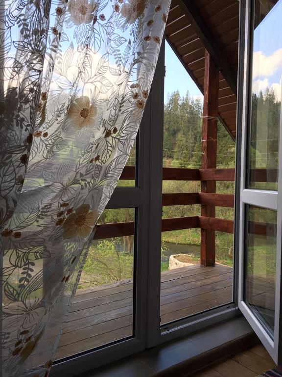 Balkón nebo terasa v ubytování Шале на зарінку