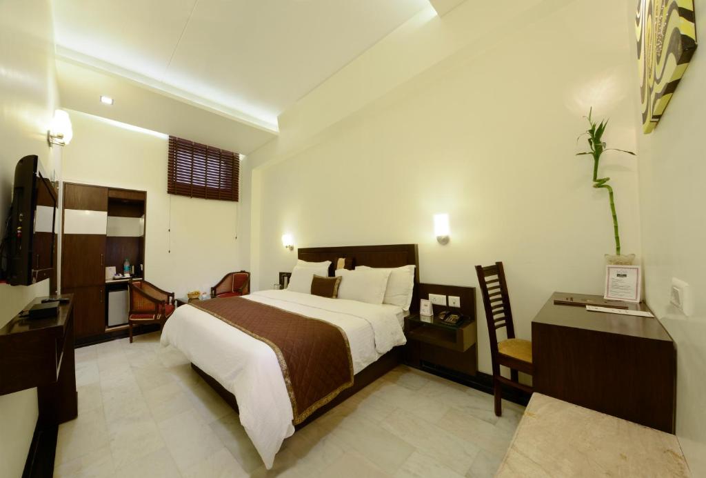 Postel nebo postele na pokoji v ubytování Hotel Taj Resorts