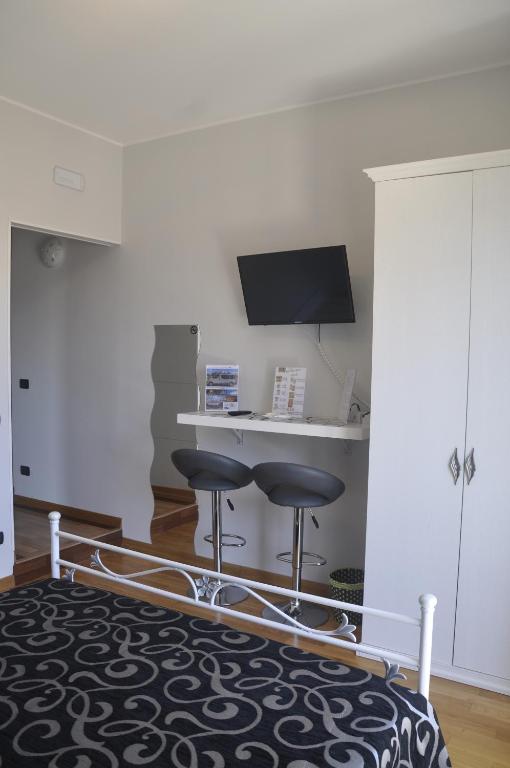 Postel nebo postele na pokoji v ubytování BnB Cheope