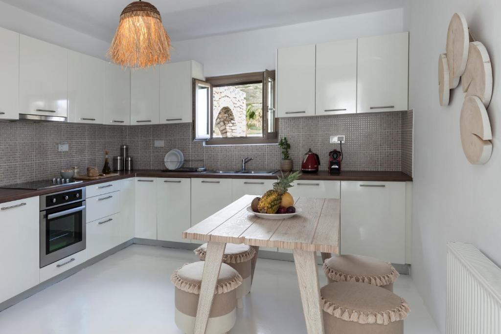 Kuchyň nebo kuchyňský kout v ubytování Amalgam Homes Paros