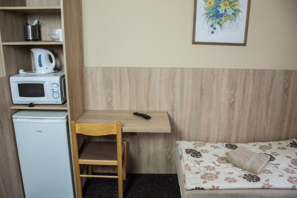 Kuchyň nebo kuchyňský kout v ubytování Penzion Krmelec