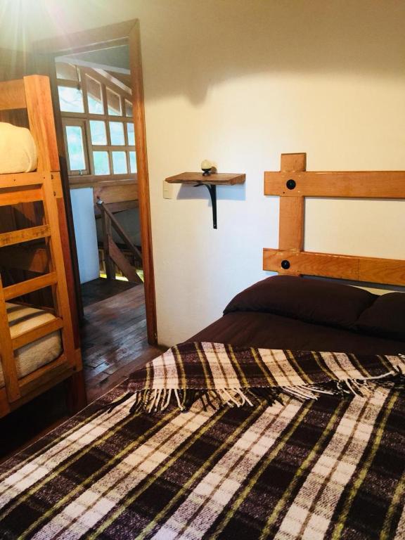 Postel nebo postele na pokoji v ubytování Cabañas las Alazanas