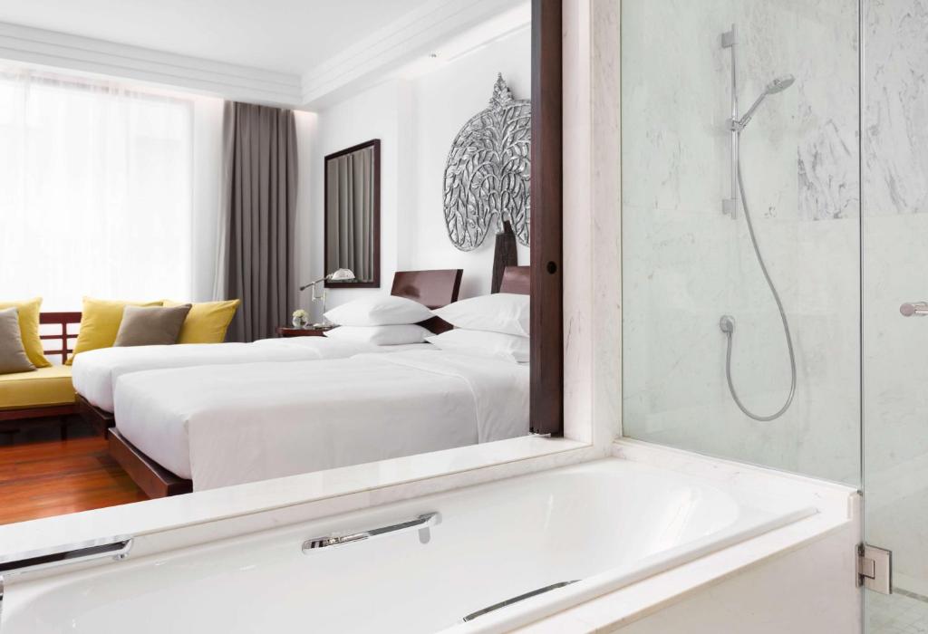 Postel nebo postele na pokoji v ubytování Park Hyatt Siem Reap