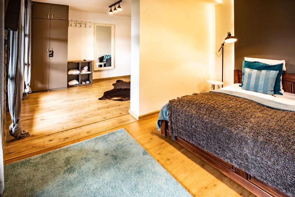 Postel nebo postele na pokoji v ubytování Boutique penzion Rech