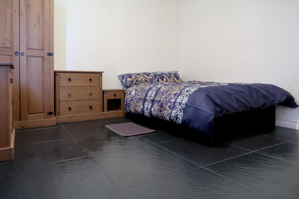 Säng eller sängar i ett rum på TEVIOT STREET - DELUXE GUEST ROOM