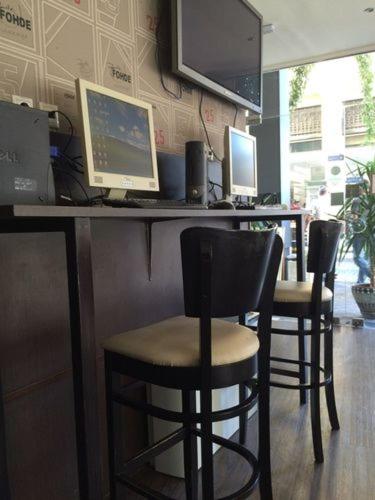Η κουζίνα ή μικρή κουζίνα στο Pella Inn Hostel