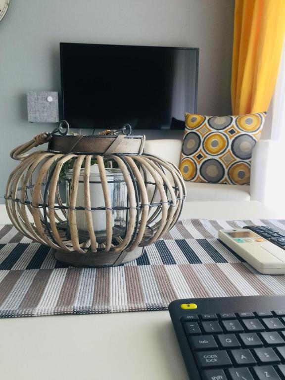 Televízia a/alebo spoločenská miestnosť v ubytovaní Alektor