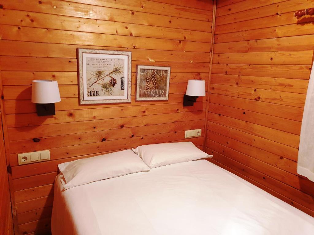 Postel nebo postele na pokoji v ubytování Aiguestortes Camping Resort