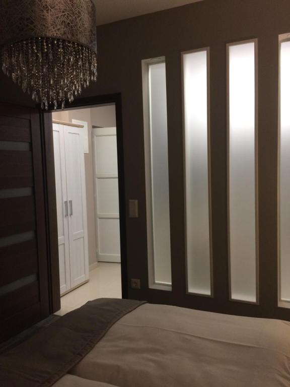 Postel nebo postele na pokoji v ubytování Orient Suite