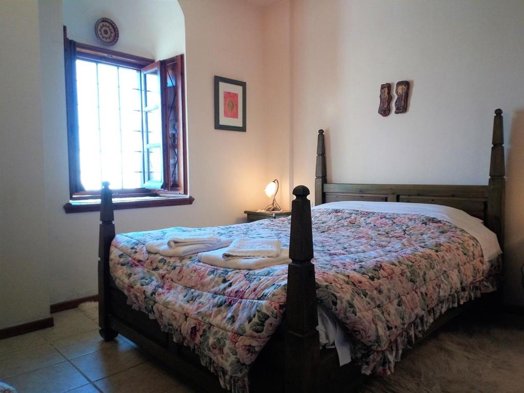 Posteľ alebo postele v izbe v ubytovaní Giordani Guesthouse