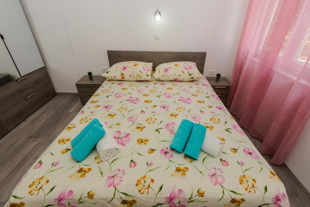 Postel nebo postele na pokoji v ubytování Apartments Basic