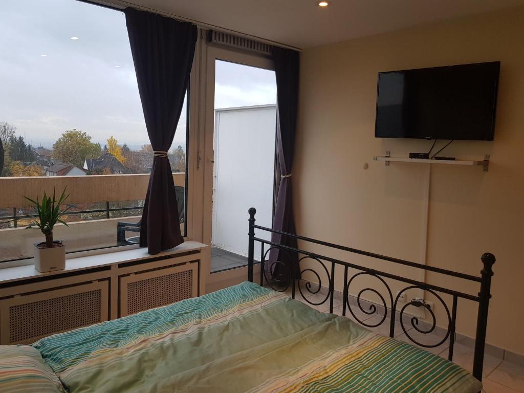 Ένα ή περισσότερα κρεβάτια σε δωμάτιο στο S&B Apartment