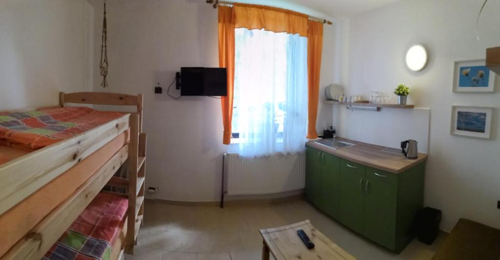 Łóżko lub łóżka w pokoju w obiekcie Penzion Bližanovy