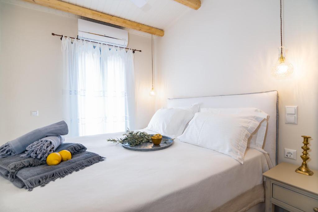 Postel nebo postele na pokoji v ubytování Iris villa