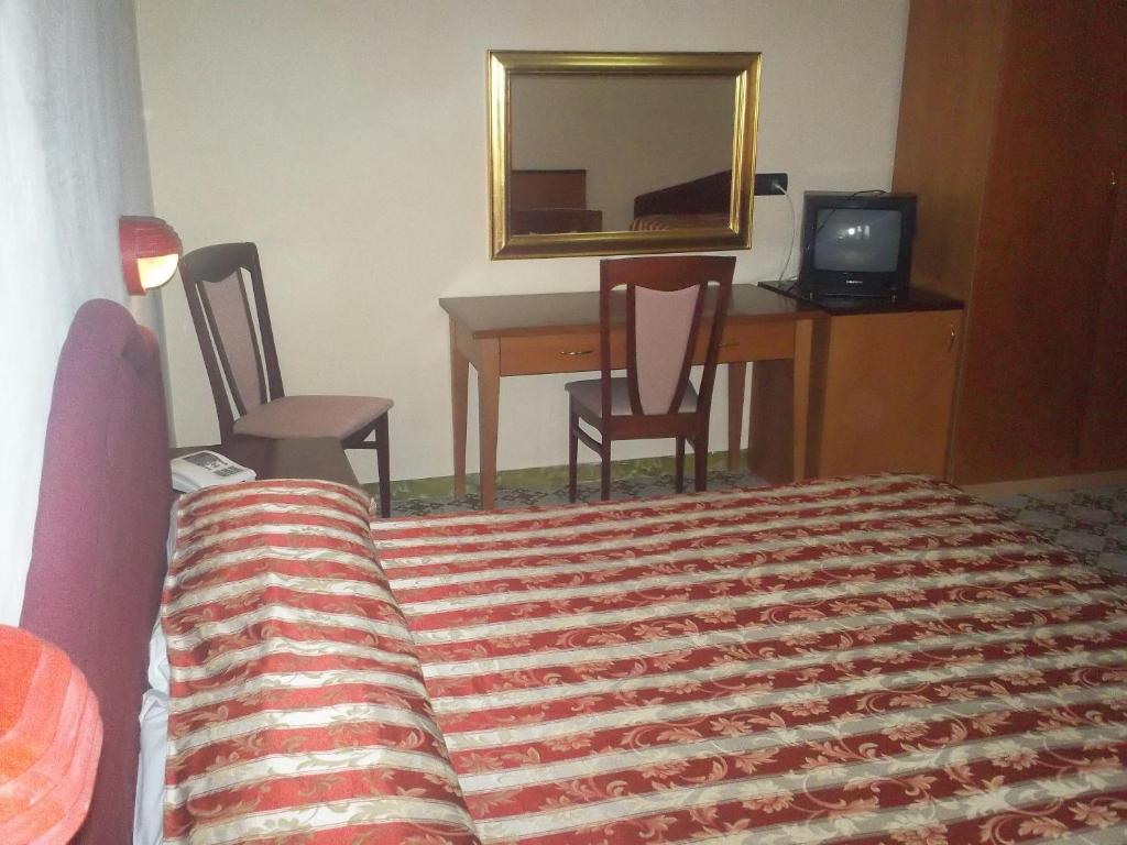 TV a/nebo společenská místnost v ubytování Hotel Gaggiano