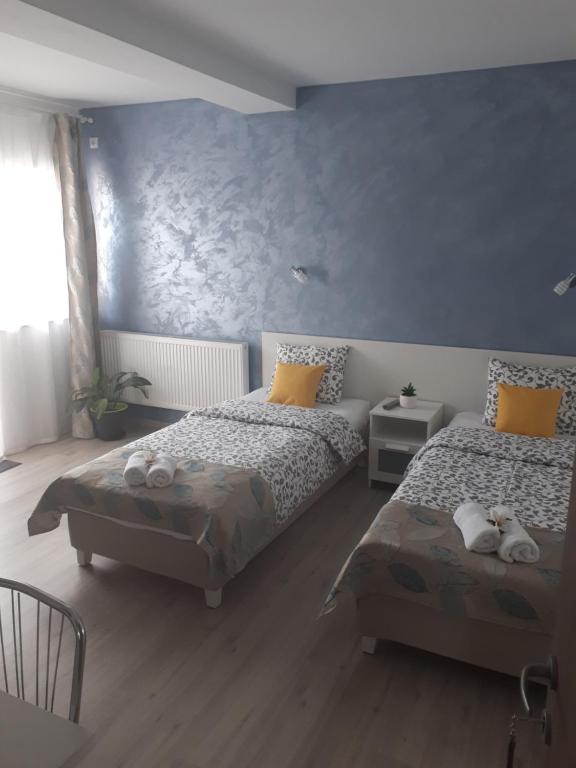 Postel nebo postele na pokoji v ubytování Top Style Villa